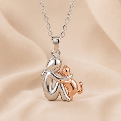 Kathryn – Person and Dog Embrace Pendant Necklace