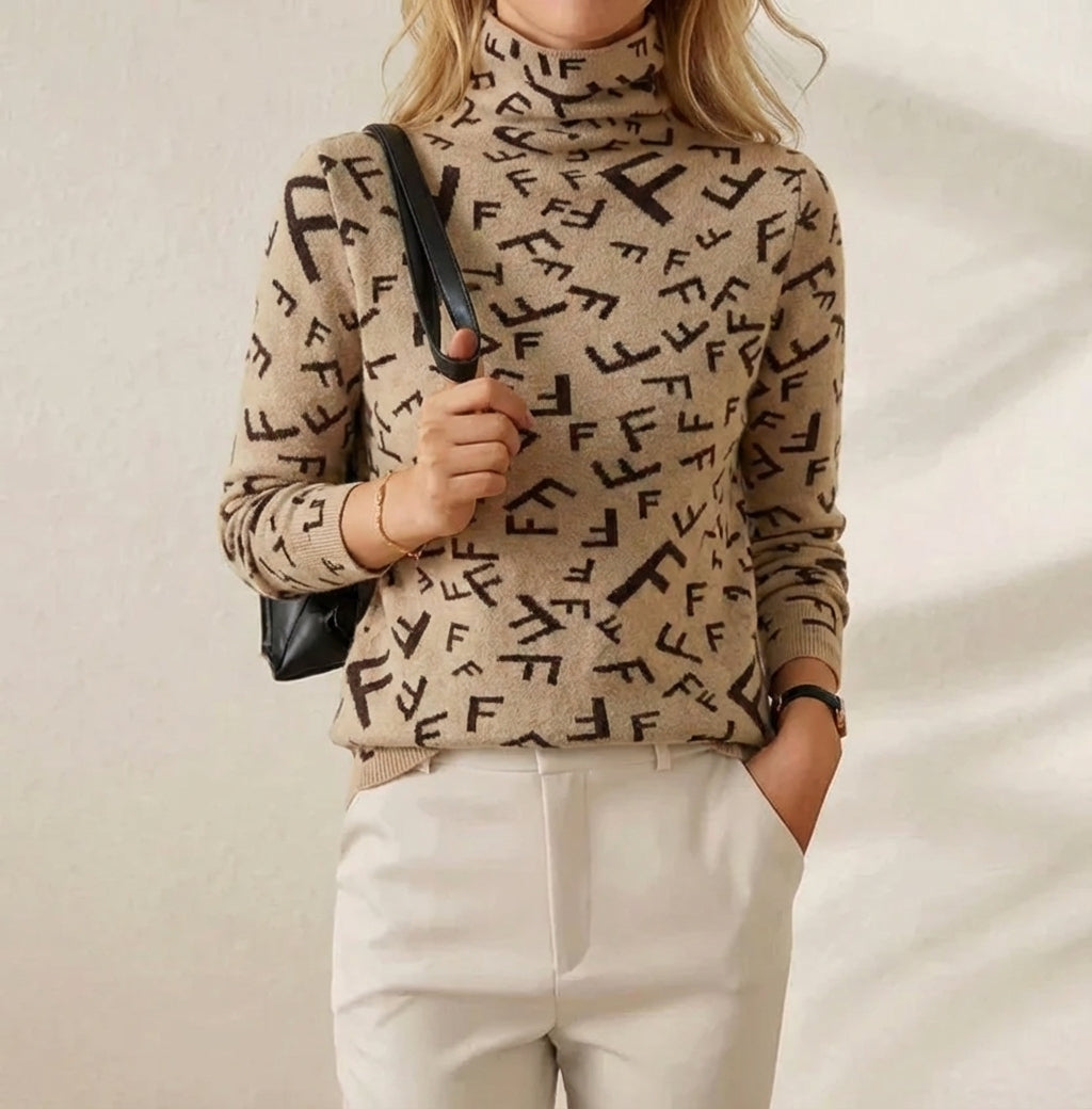 Jodi – Monogram Print Turtleneck Sweater
